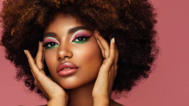 Portrait of young afro woman with bright make up